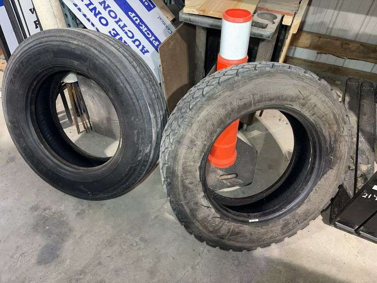 245/70 - 19.5 tires-2, one straight tread, one traction ￼tread, ￼ image