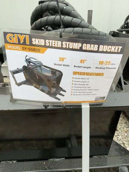 Skid steer stump grab bucket image