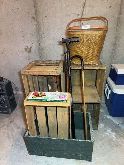 Woven Picnic Basket with Interior Lining, Wood Crates and Walking Canes image