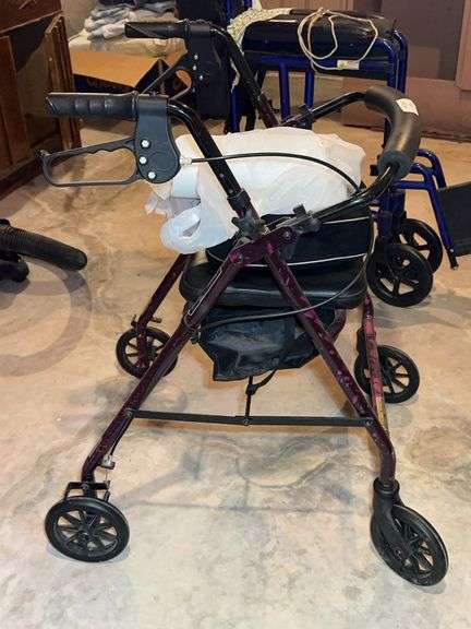 Purple Four-Wheel Walker with Seat & Accessories image