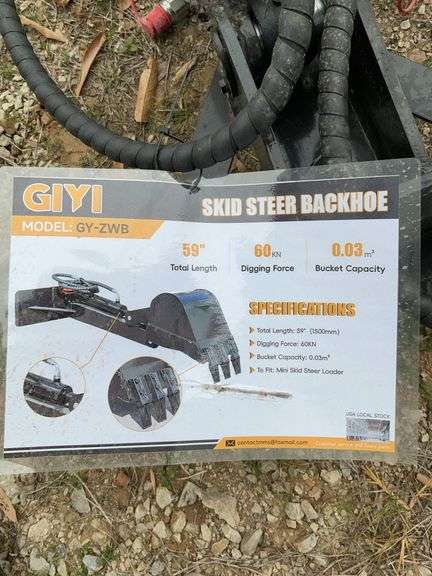 Mini skid steer backhoe image