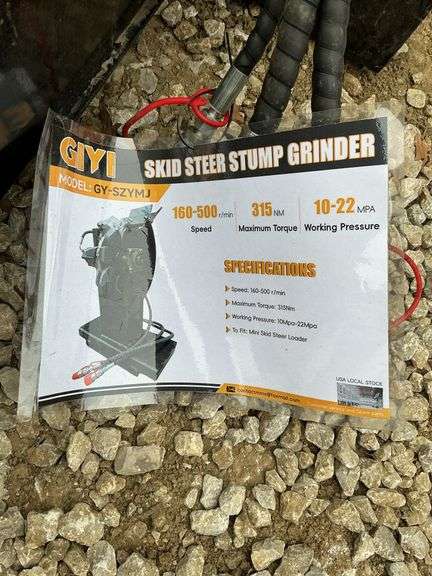 Mini skid steer stump grinder image