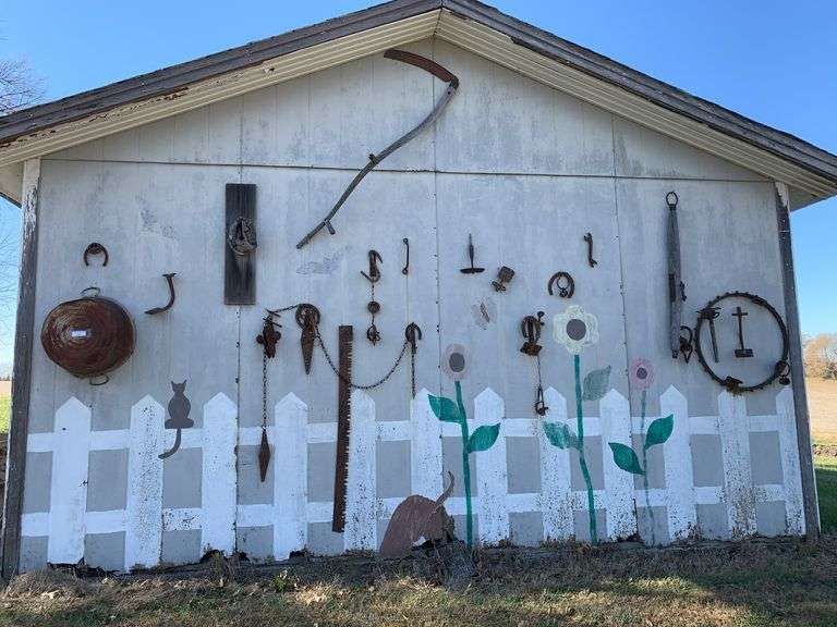 Assorted Rustic Metal Farm Implements and Tools image