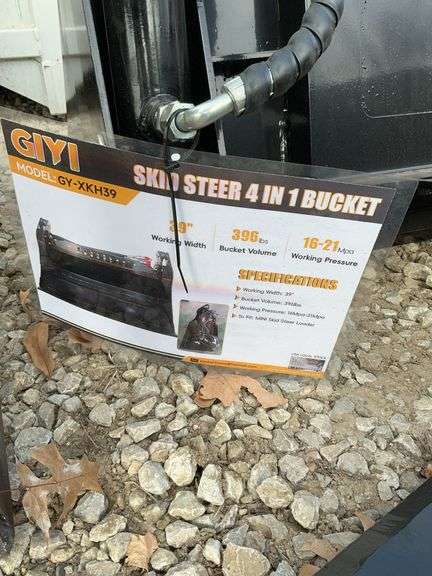 Mini skid steer. 4 in 1  bucket image