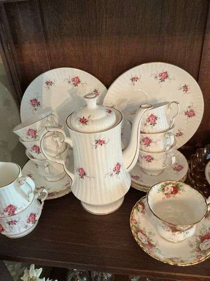 Shelf of Royal Albert, tea set and other cups ￼ image