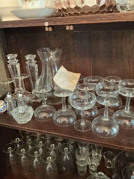 Shelf of glasses and pitcher image