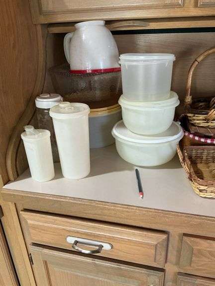 Collection of Wicker Baskets, Tupperware, Jars, and a Thermos image