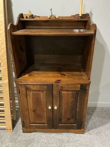 Wooden Cabinet with Upper Shelf and Lower Doors image