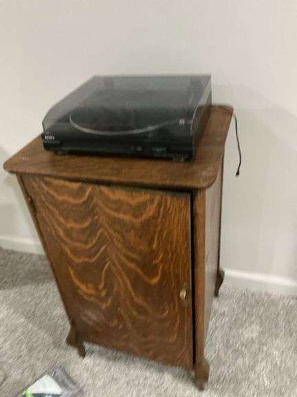Sony Turntable on Wooden Record Album Cabinet image