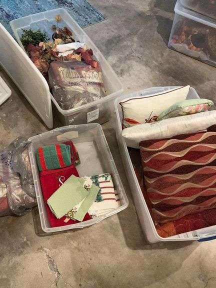 Storage Bins Filled with Assorted Home Decor image
