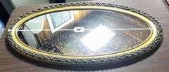Oval Framed Wall Mirror