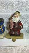 Set of Four Santa Claus Stocking Holders