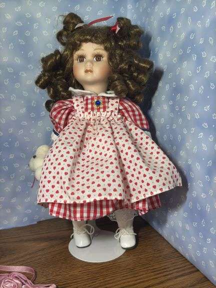 Collection of Three Porcelain Dolls with Accessories
