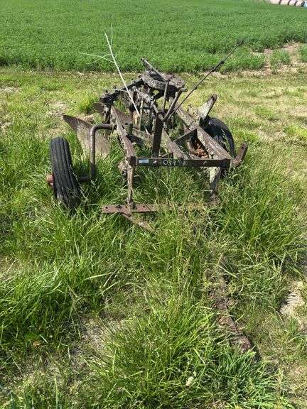 John Deere 3 bottom pull type plow, spoke wheels