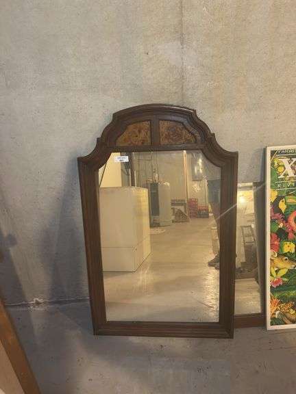 Two Framed Mirrors and an Xcaret Riviera Maya Cancun Poster