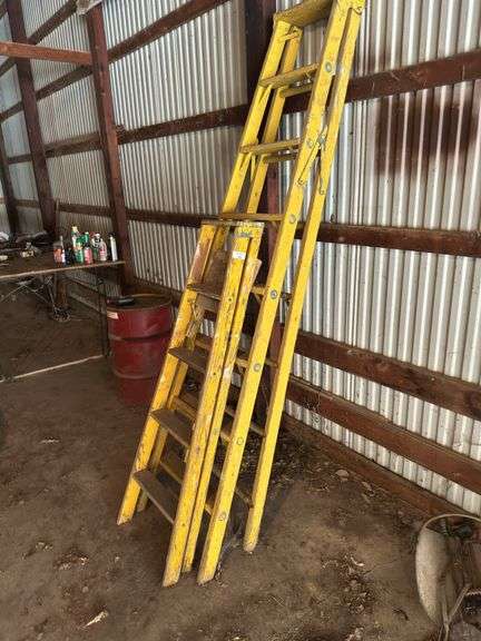 Two Yellow Step Ladders image