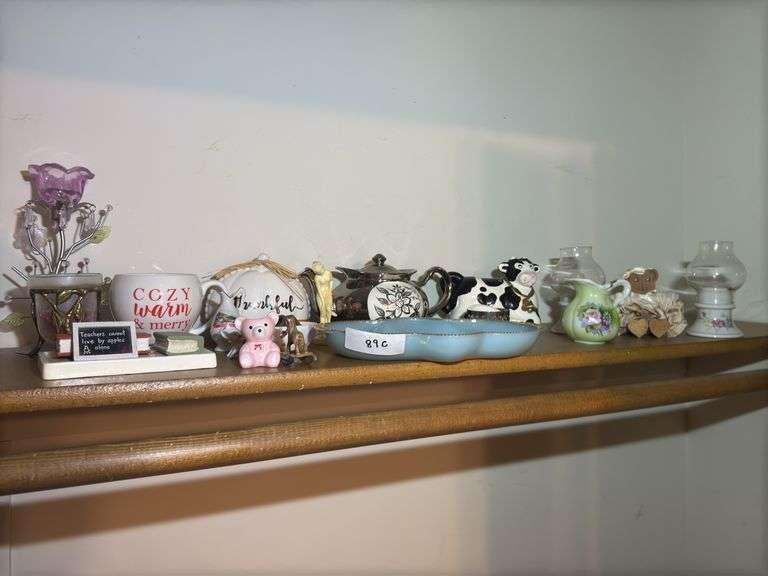 Shelf of Various Decorative Items and Fire King Dish image