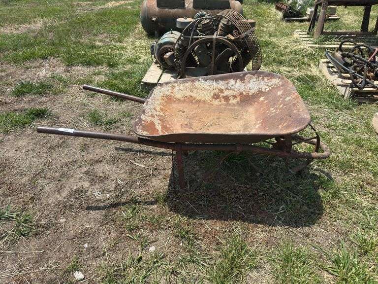 Rusty Metal Wheelbarrow image