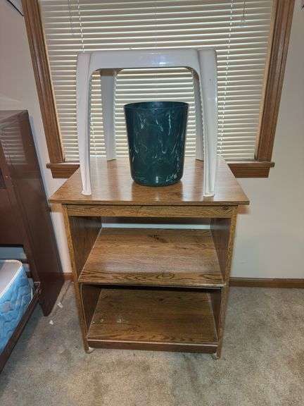 End Table with Shelf, Plastic Stool, and Planter image