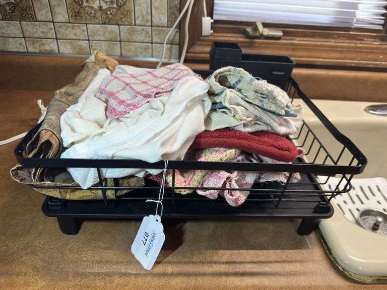 Dish Rack with Mixed Household Linens image