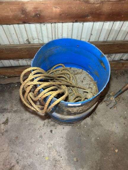 Blue Plastic Barrel with Rope image