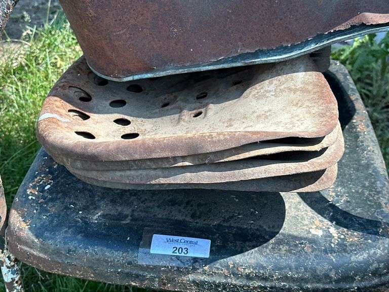 Metal Bucket, Tractor Seats, Chair, and Chainsaws