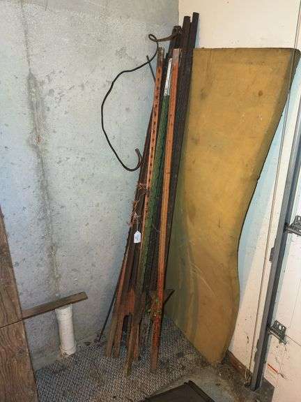 Bundle of Metal Fence Posts and Other Metal Pieces image