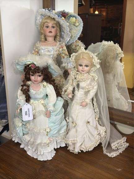 Collection of Three Porcelain Dolls in Period Style Gowns image