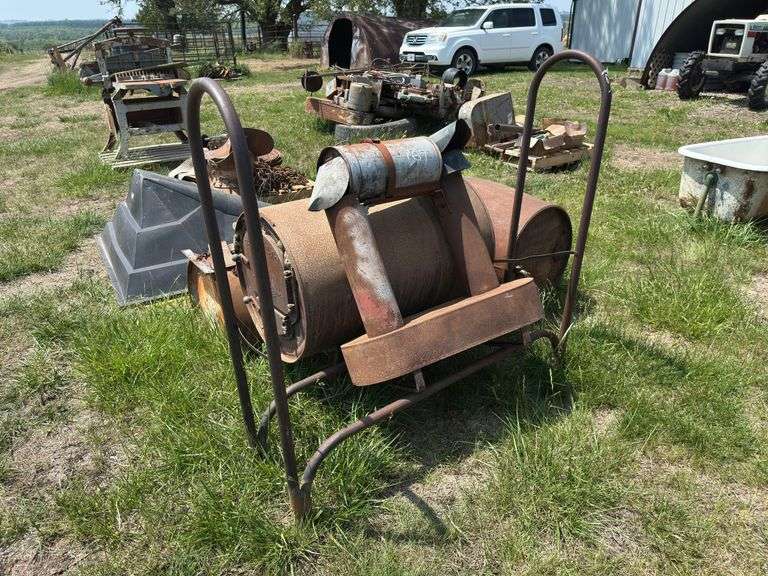 Metal Barrel wood stove, Republic Heater, axes, and Firewood Rack
