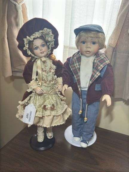 Pair of Decorative Porcelain Dolls - Boy and Girl image