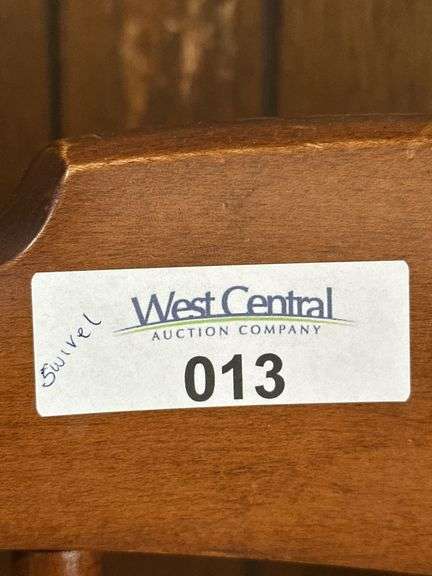 Set of Three Wood Swivel Dining Chairs