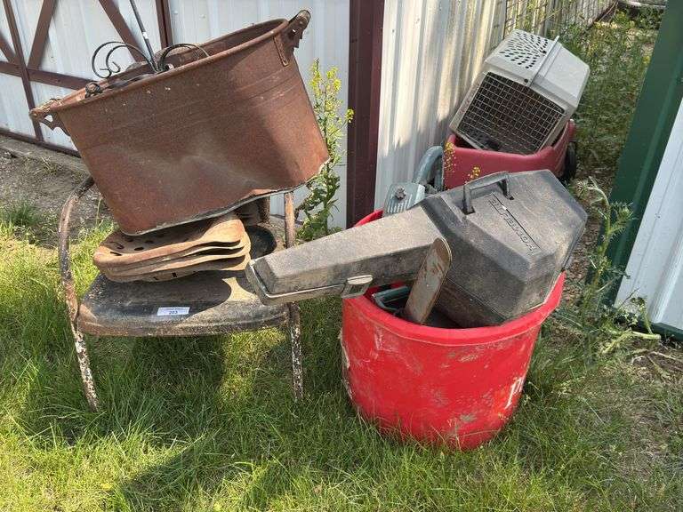 Metal Bucket, Tractor Seats, Chair, and Chainsaws image
