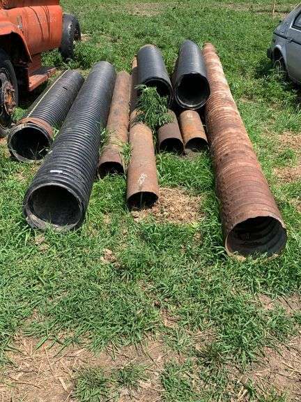 Assorted Metal and Plastic Drainage Pipes image