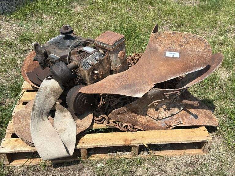 Plow Blade, Metal Discs, Engine, and Chains image