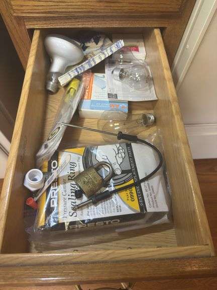 Kitchen Drawer Contents: Light Bulbs, Canning Supplies, and Kitchen towels/potholders image