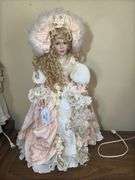 Cherilyn Porcelain Doll with Blonde Hair and Pink Dress