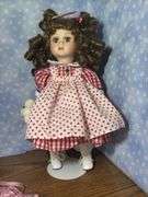 Collection of Three Porcelain Dolls with Accessories