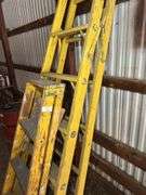 Two Yellow Step Ladders