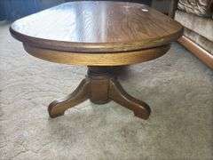 Oval Wooden Coffee Table with Pedestal Base