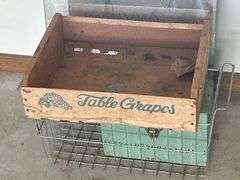 Frameless Standing Mirror with Grapes Box, Metal Basket, and Contents of a Green Box