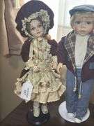 Pair of Decorative Porcelain Dolls - Boy and Girl