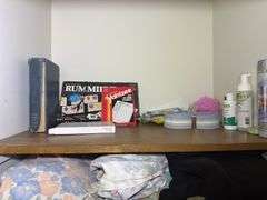 Contents of Closet: Linens, Pillows, Games, & More