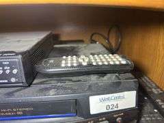 Panasonic PV-8450 VCR, Magnavox DVD Player, and Remotes