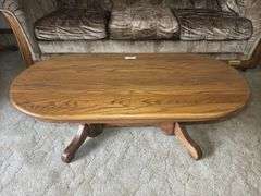 Oval Wooden Coffee Table with Pedestal Base