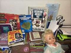 Books, Doll, and Miniature Rocking Chair