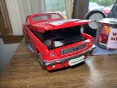 Mixed Collection: Uncle Sam Figure, Ford Mustang, Clock, Candle, and Figurine