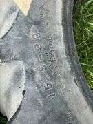 Two Tractor Tires: Firestone 14-30 and B.F. Goodrich 15-38