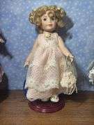 Three Collectible Porcelain Dolls