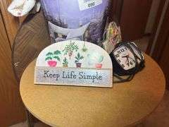 Round Side Table with Assorted Home Decor Items