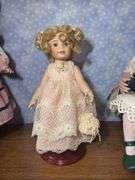 Three Collectible Porcelain Dolls